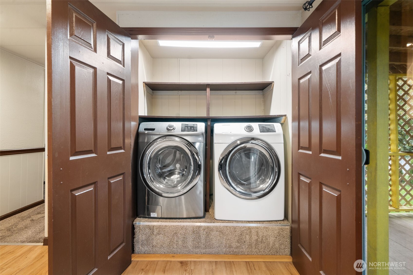 400 Gupster Road, Unit 1 Sequim, WA 98382 - Photo 27 of 39 a view of a hallway with washer and dryer