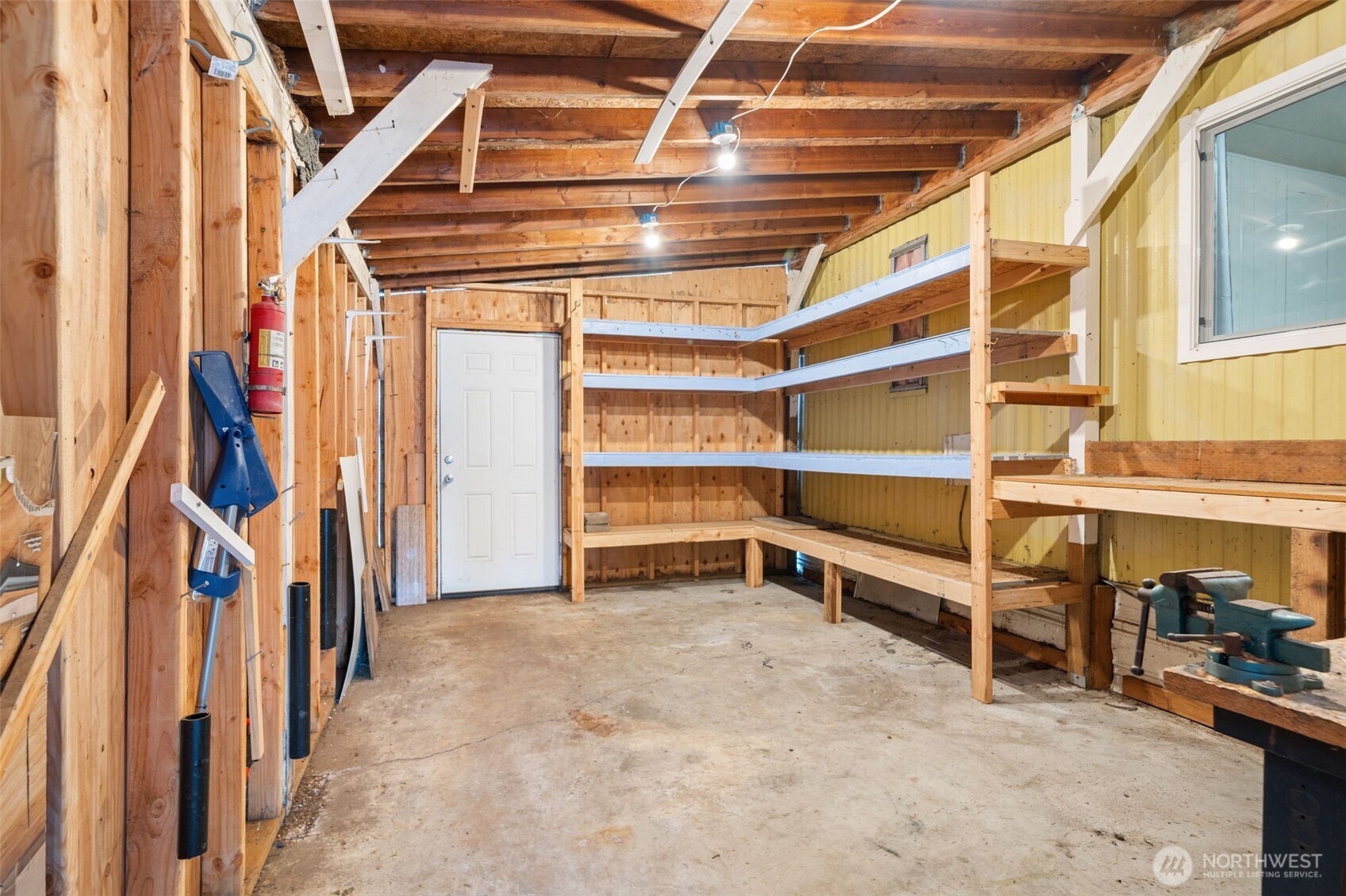 400 Gupster Road, Unit 1 Sequim, WA 98382 - Photo 28 of 39 a view of an empty room with storage