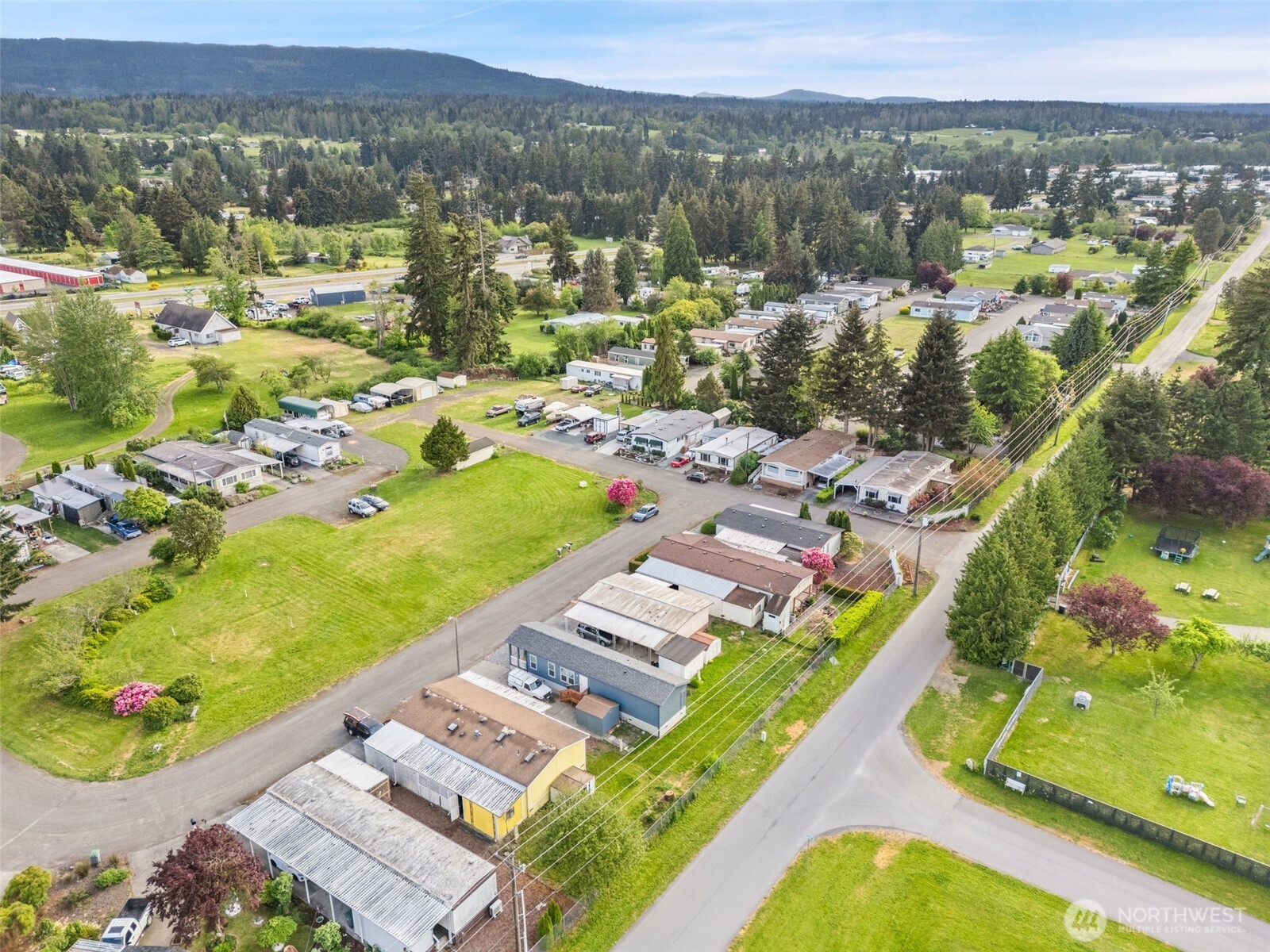 400 Gupster Road, Unit 1 Sequim, WA 98382 - Photo 38 of 39 a view of a city with mountains