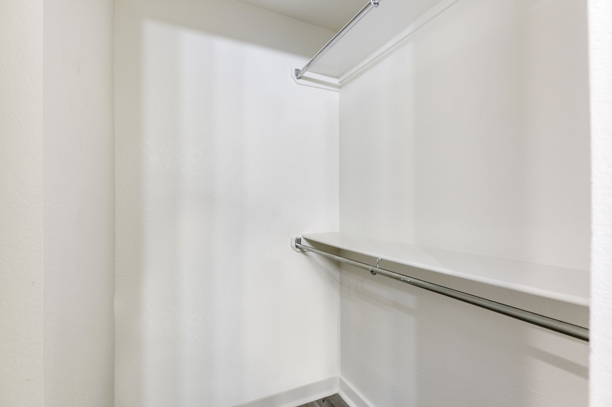 21155 Gosling Road, Unit 11B Spring, TX 77388 - Photo 14 of 27 a close up view of racks on the wall