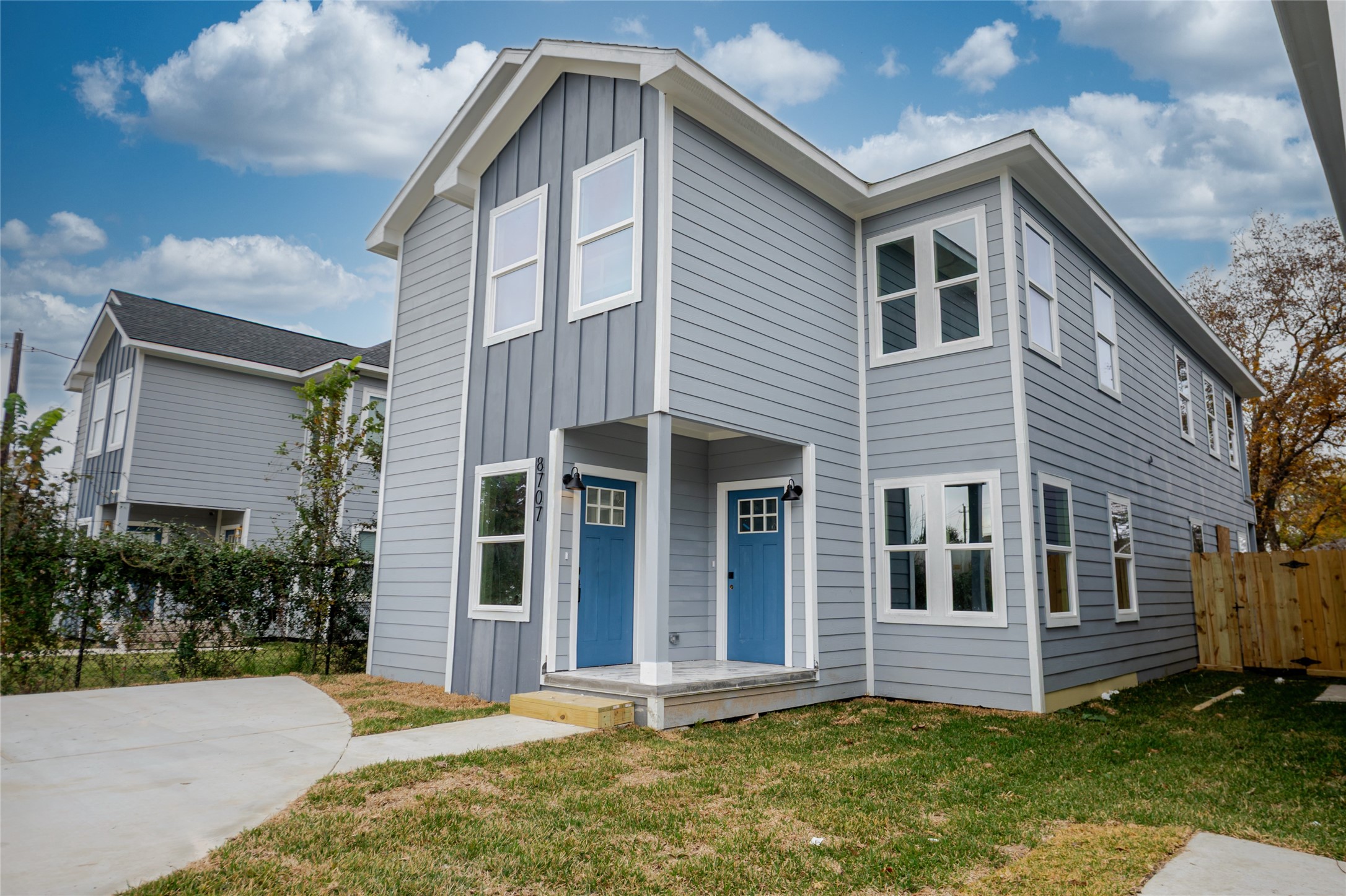 8707 Westcott Road, Unit A AND B Houston, TX 77016 - Photo 3 of 14 a front view of a house with a yard