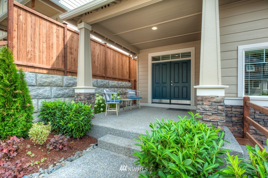 21127 Meridian Drive Southeast, Unit P23 Bothell, WA 98021 - Photo 27 of 40 a front view of a house with garden