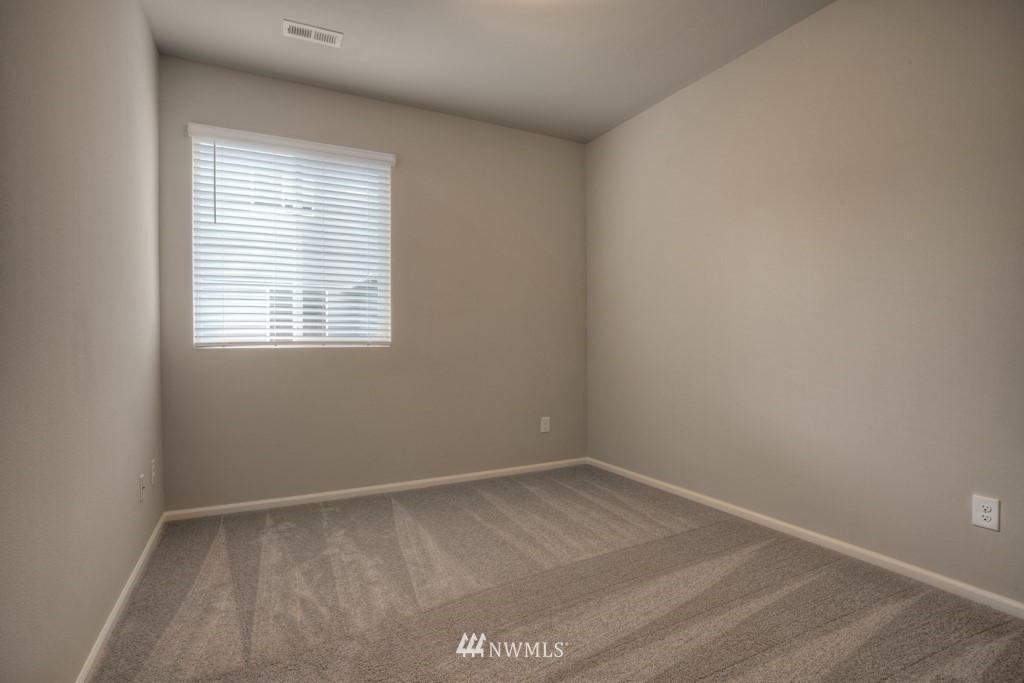 21127 Meridian Drive Southeast, Unit P23 Bothell, WA 98021 - Photo 28 of 40 an empty room with a window