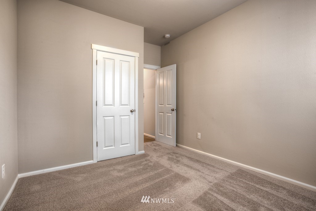 21127 Meridian Drive Southeast, Unit P23 Bothell, WA 98021 - Photo 29 of 40 an empty room with windows