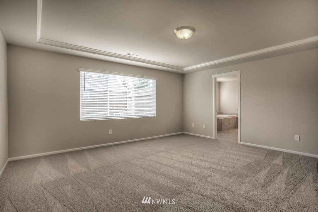 21127 Meridian Drive Southeast, Unit P23 Bothell, WA 98021 - Photo 34 of 40 an empty room with windows
