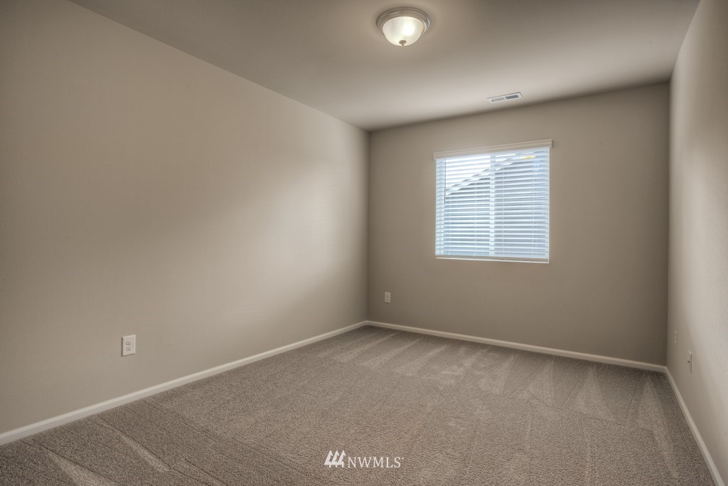 21127 Meridian Drive Southeast, Unit P23 Bothell, WA 98021 - Photo 39 of 40 an empty room with windows