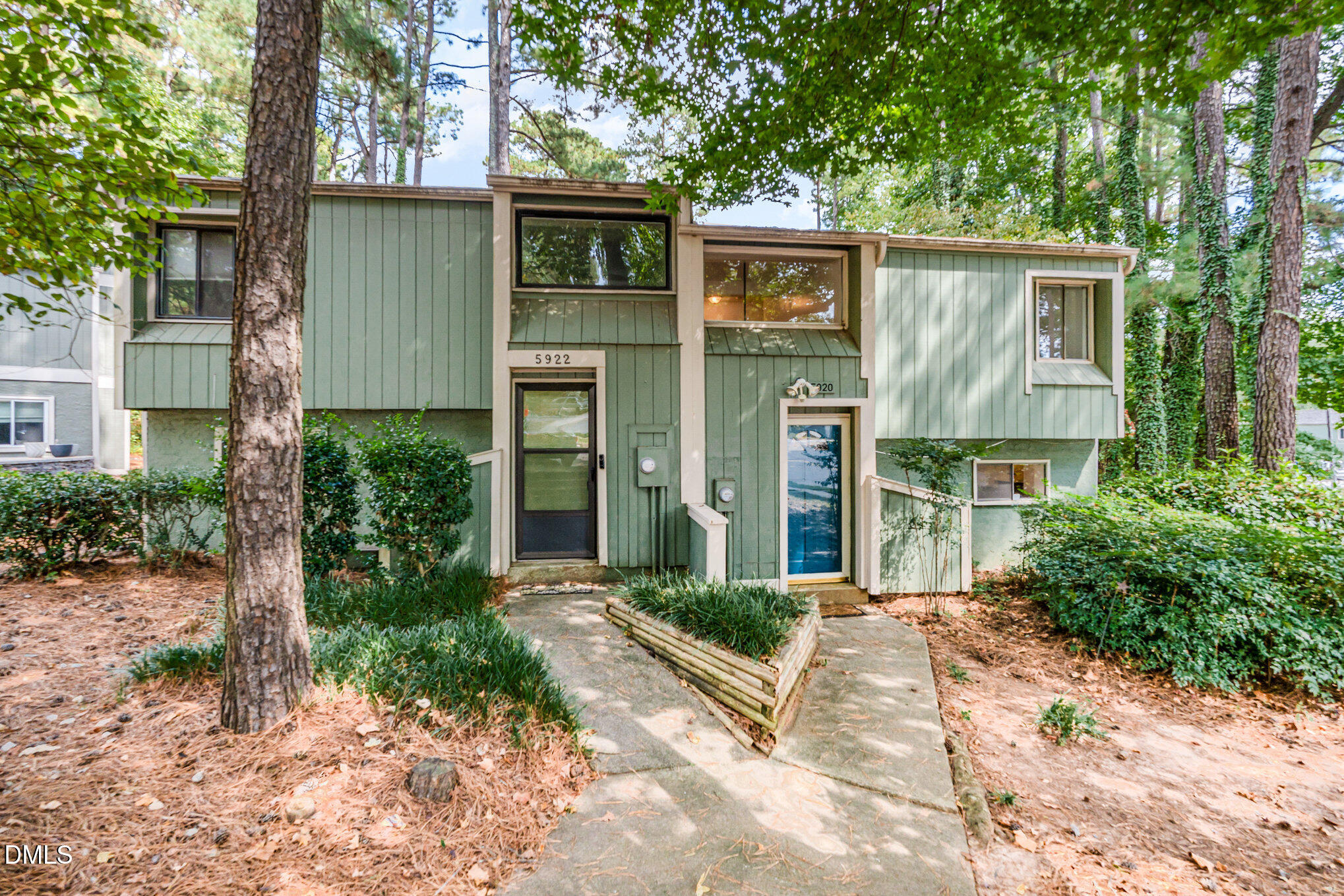 5920 Farm Gate Road Raleigh, NC 27606 - Photo 17 of 17 front view of a house with a yard