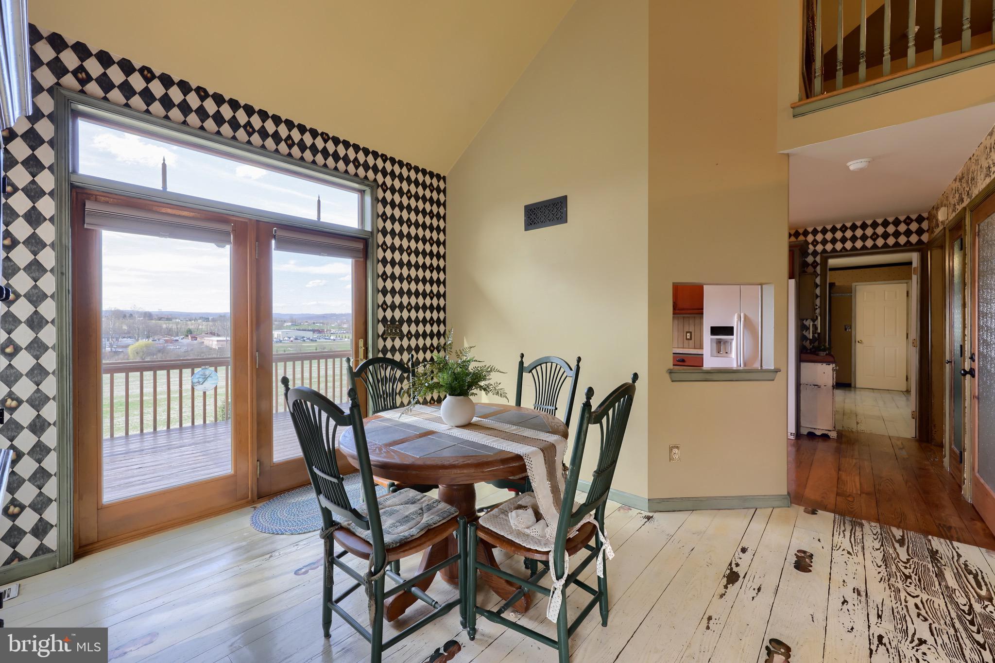 65 South Reamstown Road Stevens, PA 17578 - Photo 12 of 55 a view of a dining room with furniture and a window