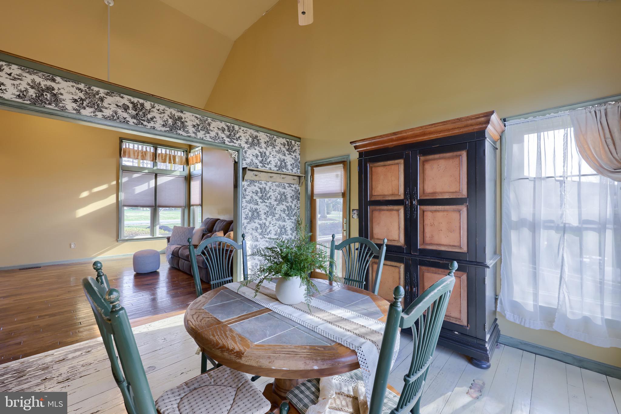 65 South Reamstown Road Stevens, PA 17578 - Photo 15 of 55 a view of a dining room with furniture window and wooden floor