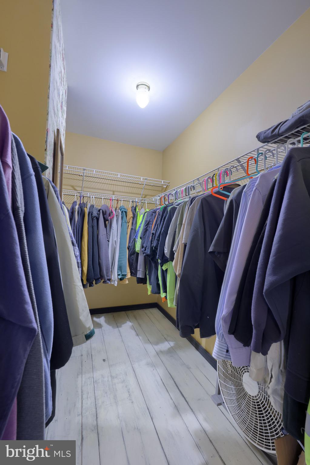 65 South Reamstown Road Stevens, PA 17578 - Photo 24 of 55 a view of walk in closet with clothes