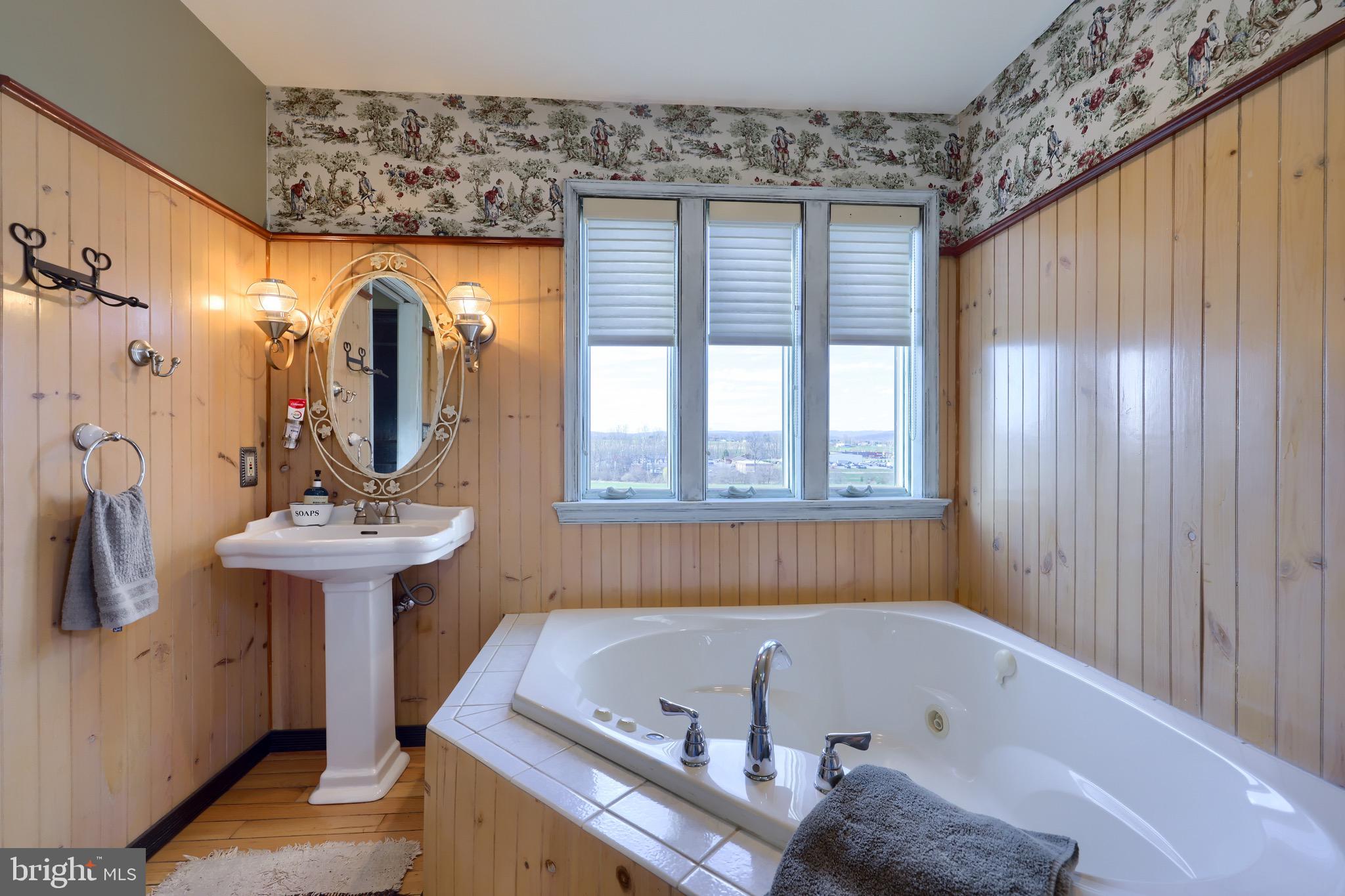 65 South Reamstown Road Stevens, PA 17578 - Photo 26 of 55 a bathroom with a tub sink and mirror