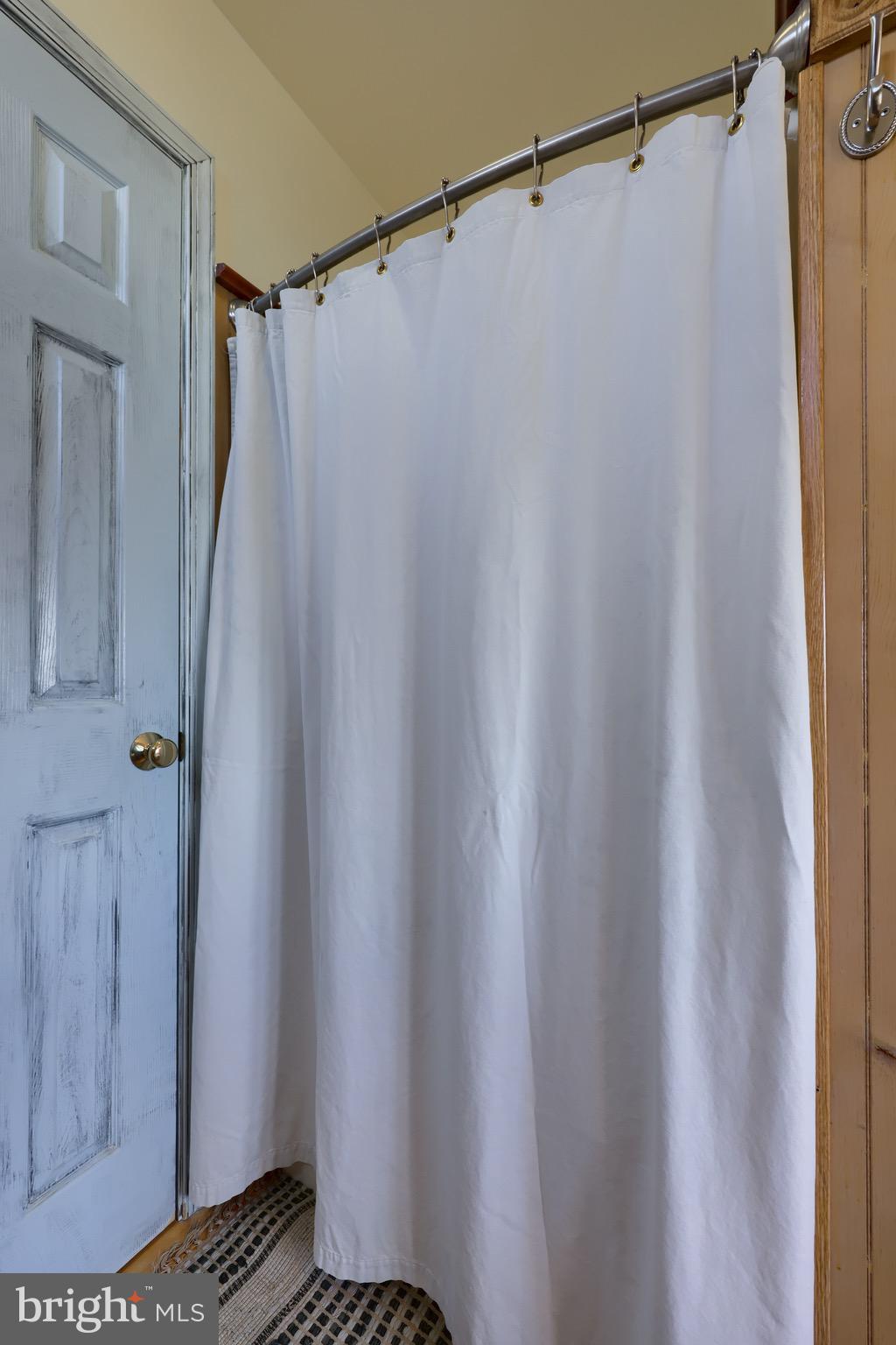 65 South Reamstown Road Stevens, PA 17578 - Photo 27 of 55 a bathroom with a shower and a tub