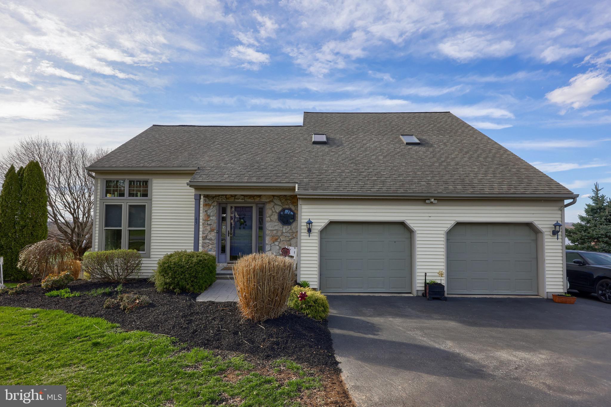 65 South Reamstown Road Stevens, PA 17578 - Photo 3 of 55 a front view of a house with garden