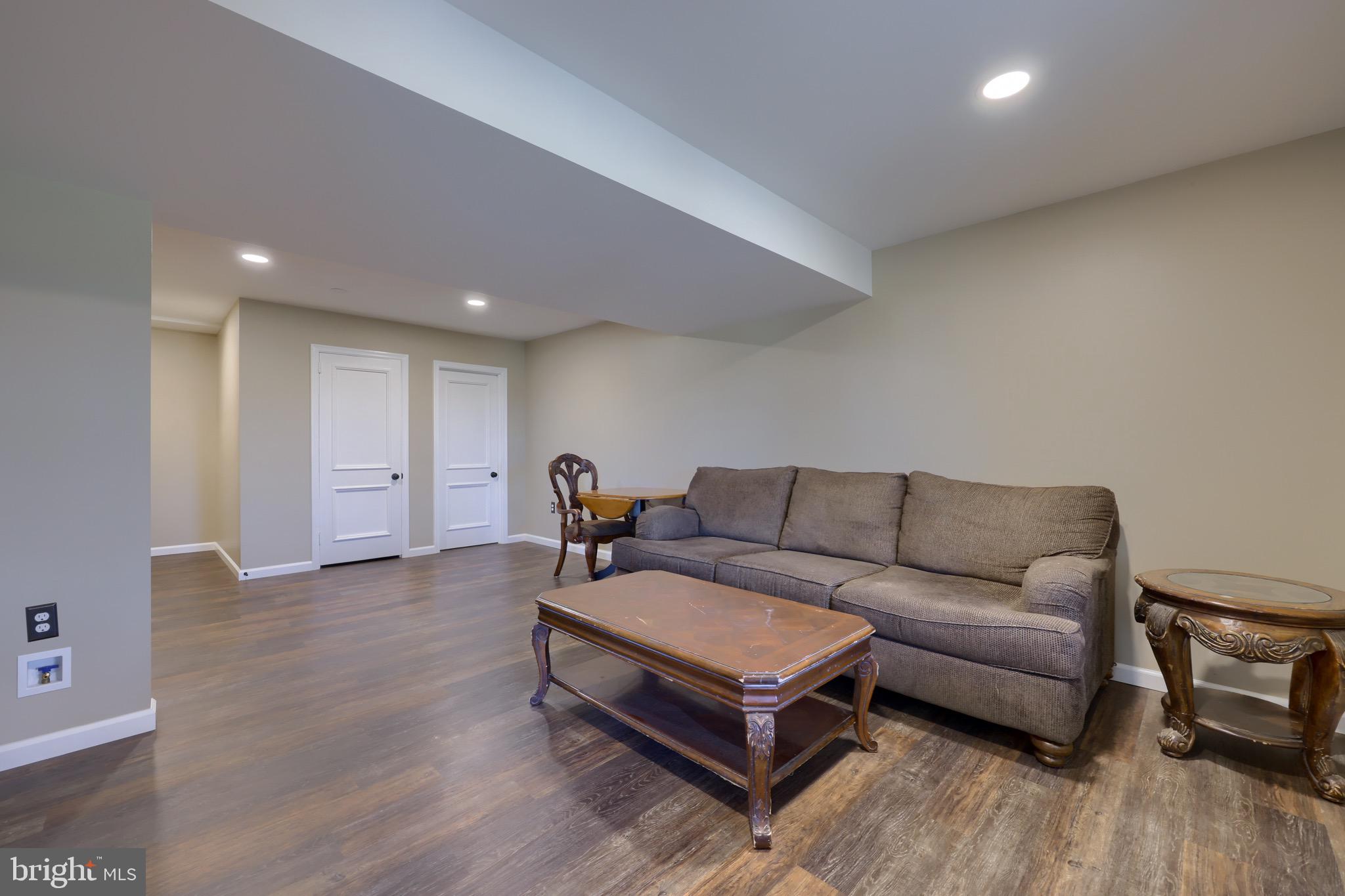 65 South Reamstown Road Stevens, PA 17578 - Photo 41 of 55 a living room with furniture and a wooden floor