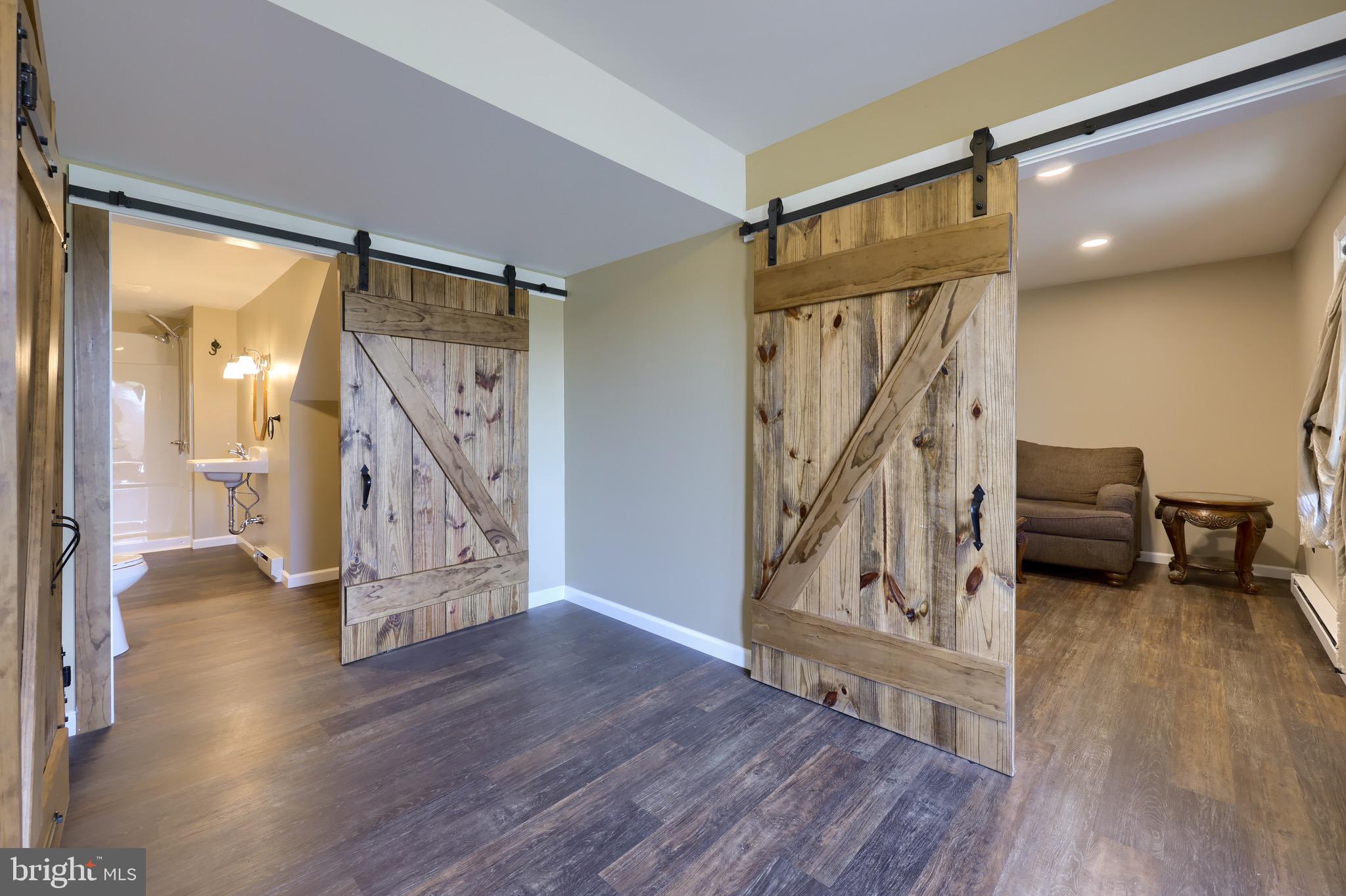 65 South Reamstown Road Stevens, PA 17578 - Photo 42 of 55 a view of an entryway with wooden floor and a livingroom
