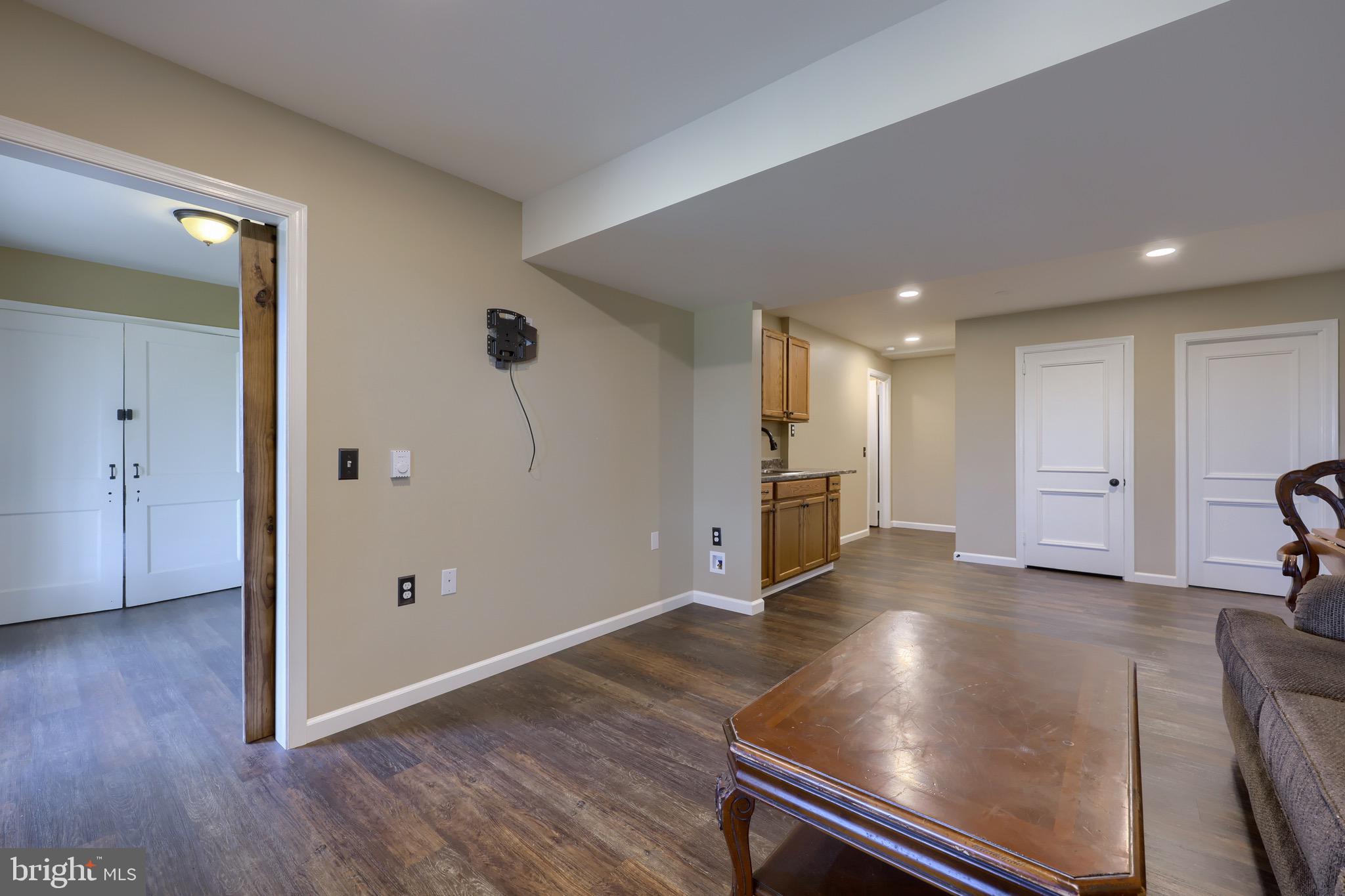 65 South Reamstown Road Stevens, PA 17578 - Photo 44 of 55 wooden floor in an empty room with a window