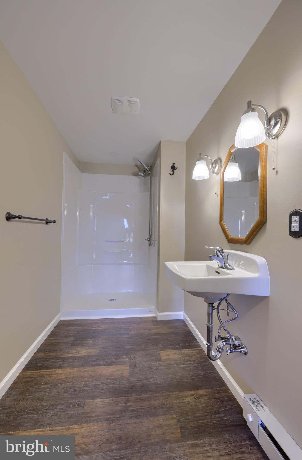 65 South Reamstown Road Stevens, PA 17578 - Photo 46 of 55 a view of a bathroom sink and mirror