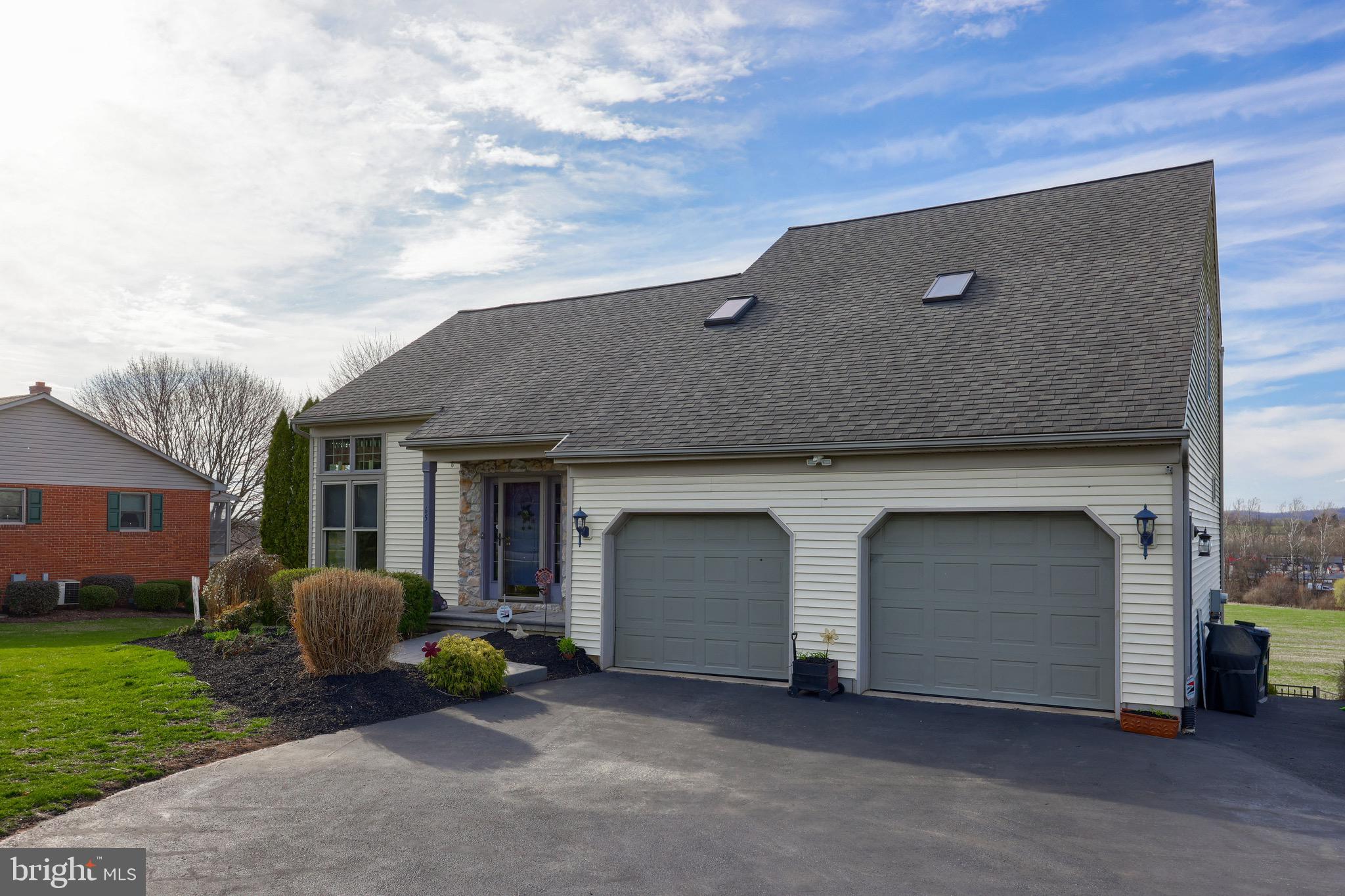 65 South Reamstown Road Stevens, PA 17578 - Photo 51 of 55 a view of a house with yard and a garage