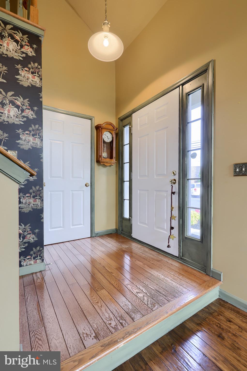65 South Reamstown Road Stevens, PA 17578 - Photo 7 of 55 a view of an empty room with wooden floor and a bathroom