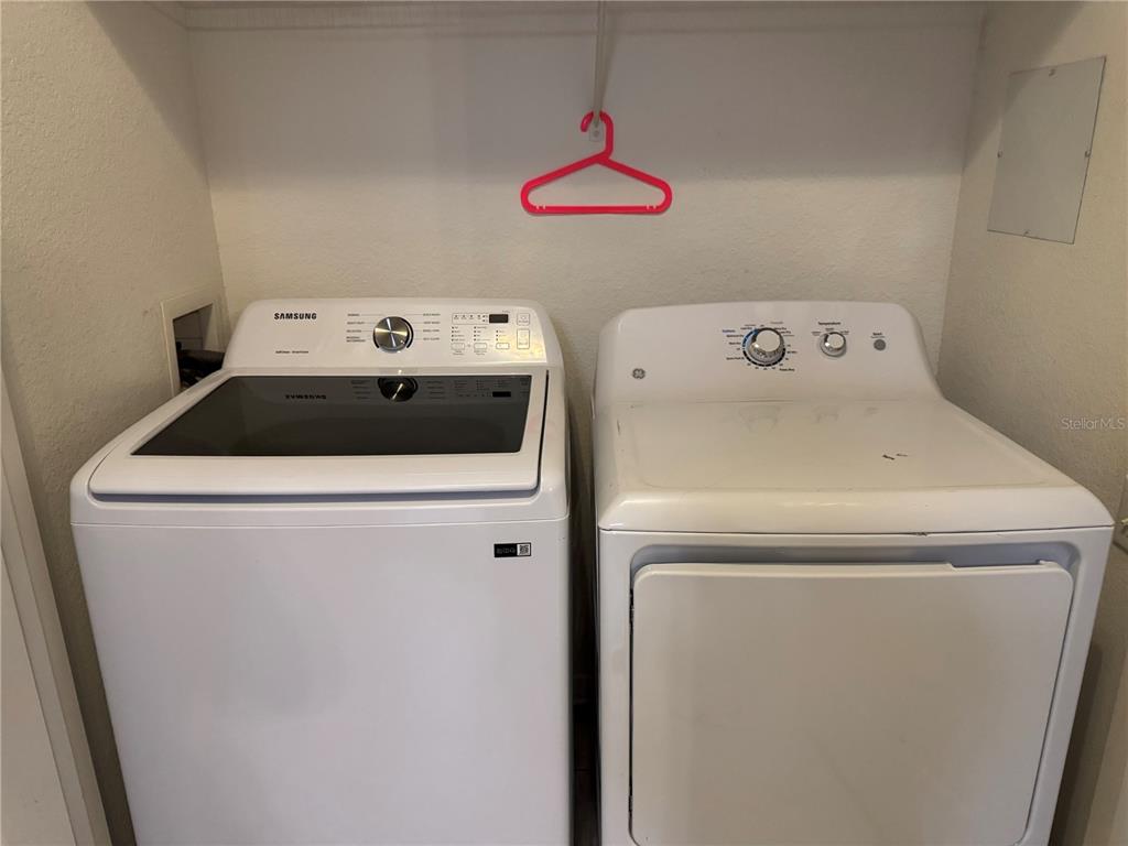 7664 Comrow Street, Unit 204 Kissimmee, FL 34747 - Photo 16 of 17 a utility room with dryer and washer