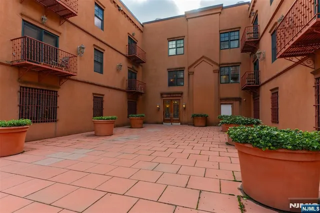 a view of a terrace with chairs