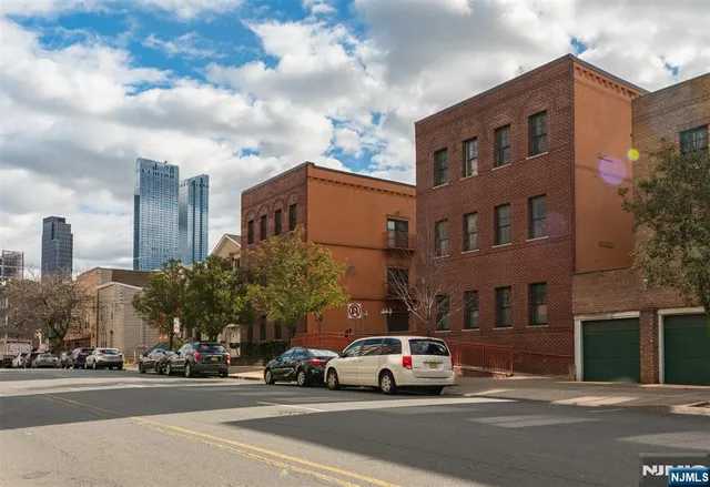 a view of a cars parked in front of a building