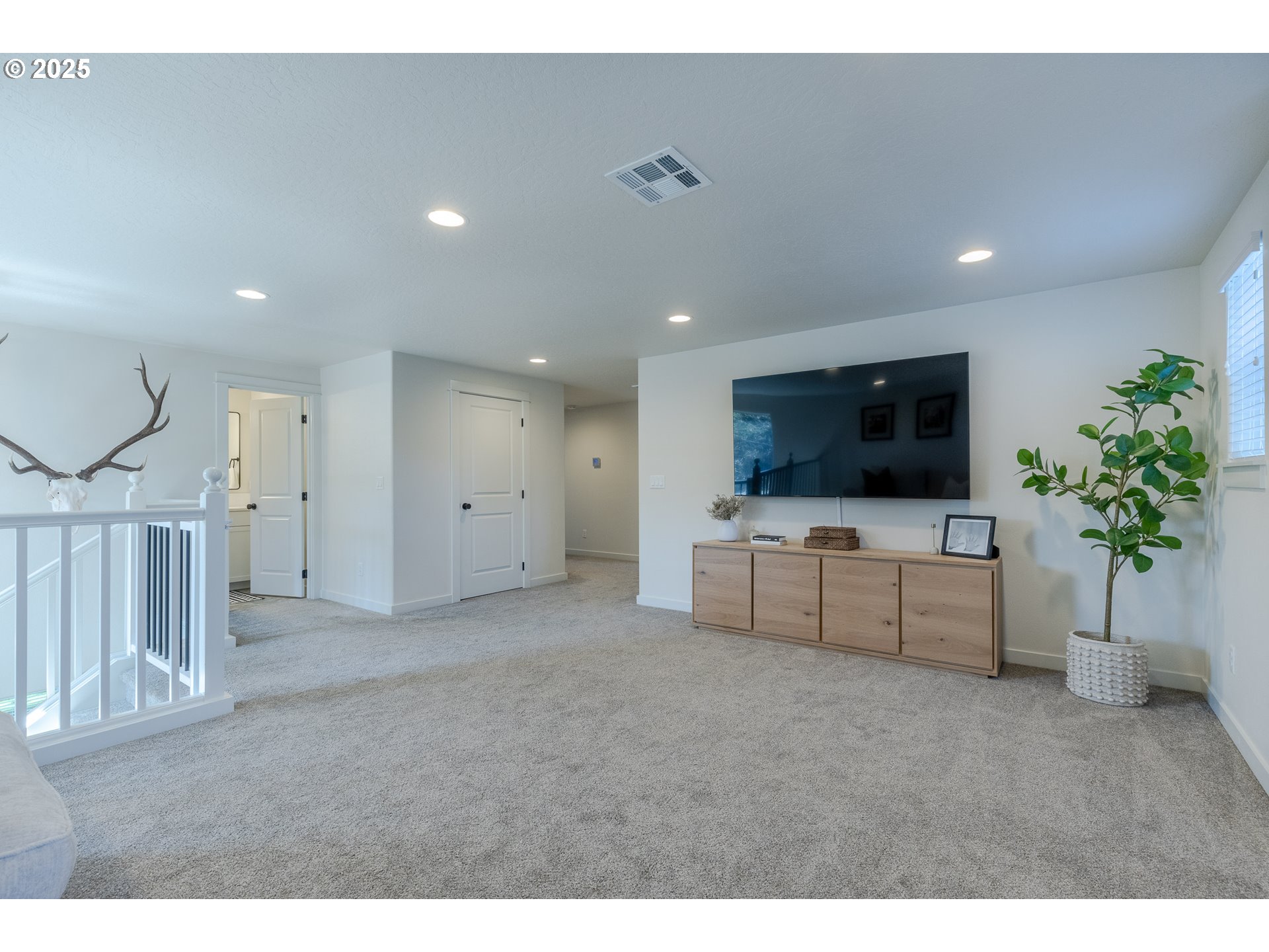 782 South 52nd Street Springfield, OR 97478 - Photo 25 of 41 a living room with furniture and a flat screen tv