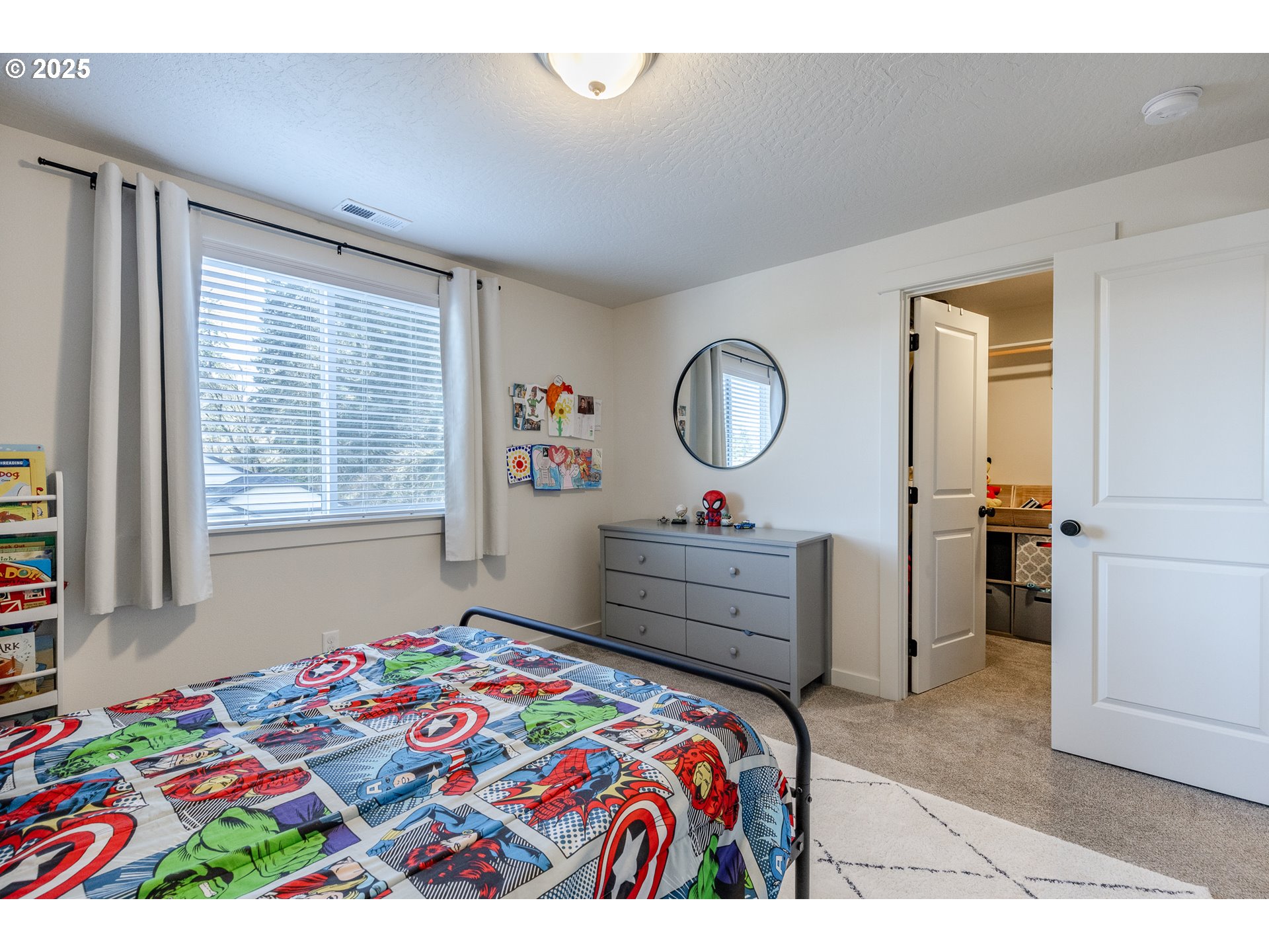 782 South 52nd Street Springfield, OR 97478 - Photo 28 of 41 a bedroom with a bed window and mirror