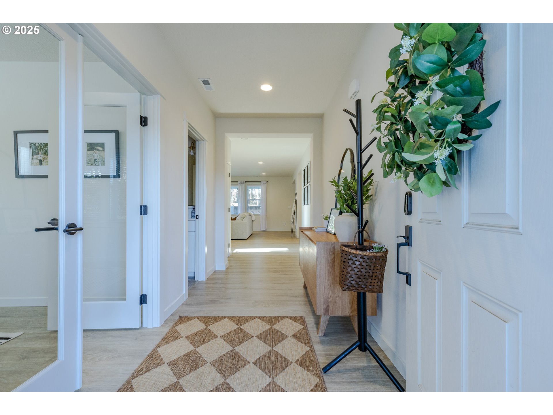 782 South 52nd Street Springfield, OR 97478 - Photo 3 of 41 a view of entryway with livingroom and potted plant