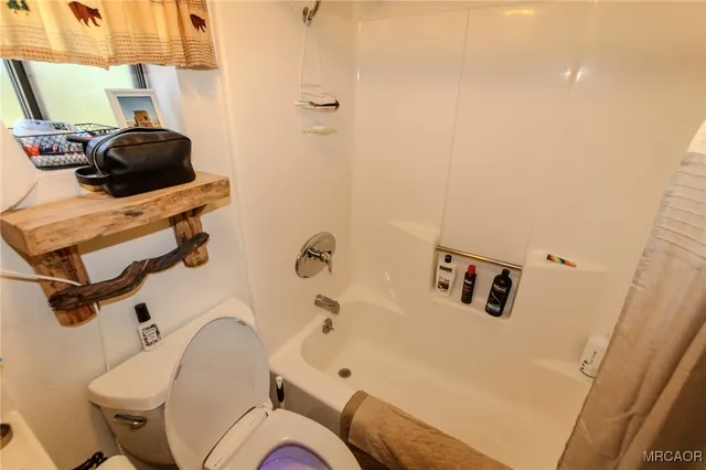 a view of balcony with furniture