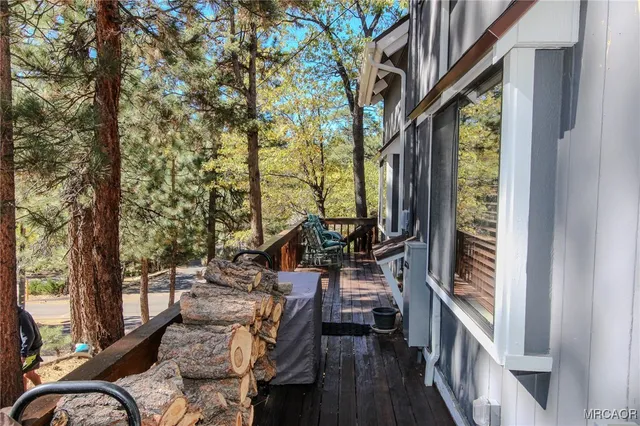 an outdoor space with patio and umbrella