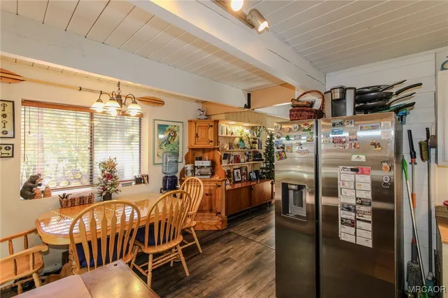a very nice looking room with chairs and a large window