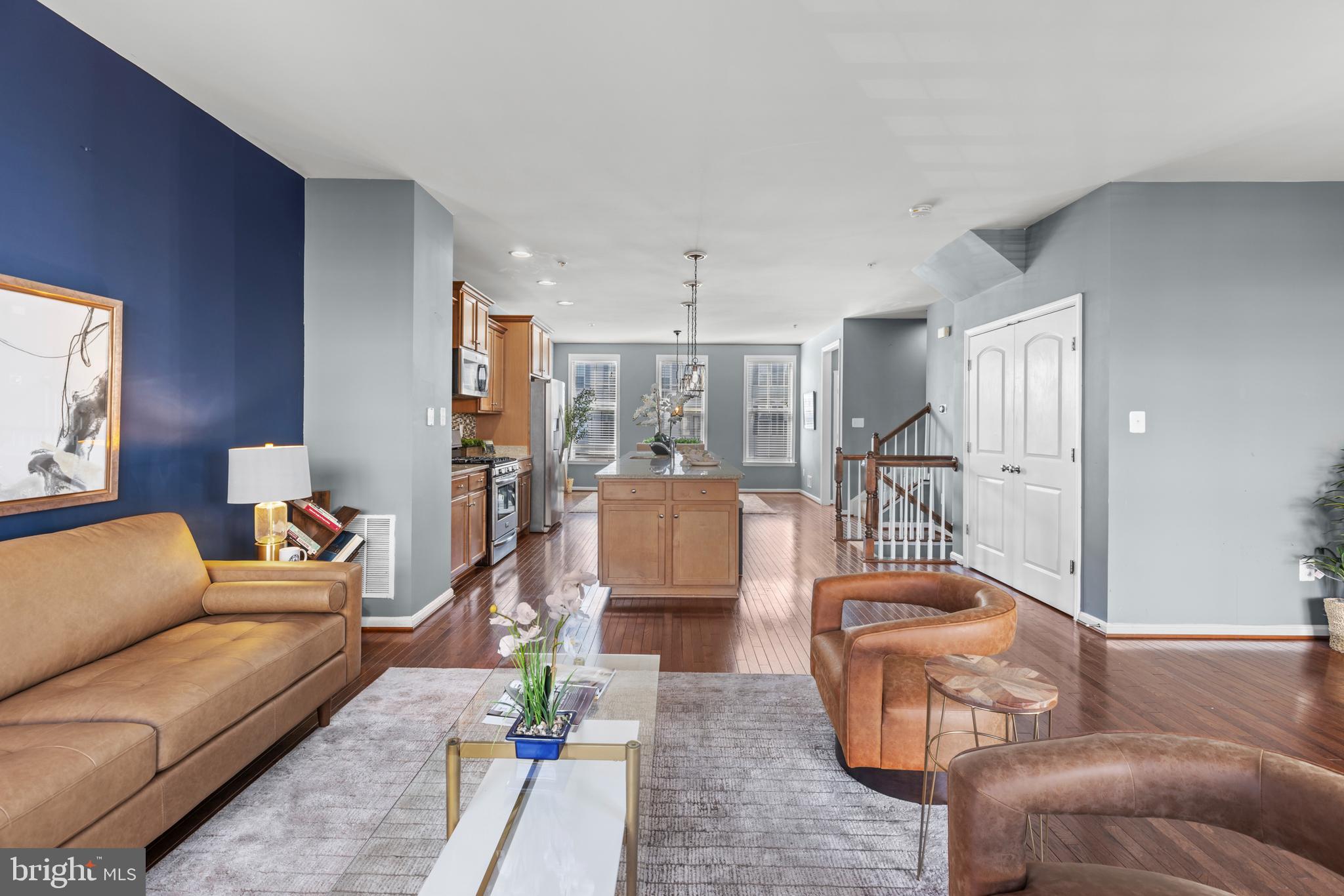 6552 Britannic Place Frederick, MD 21703 - Photo 11 of 34 a living room with furniture and a large window