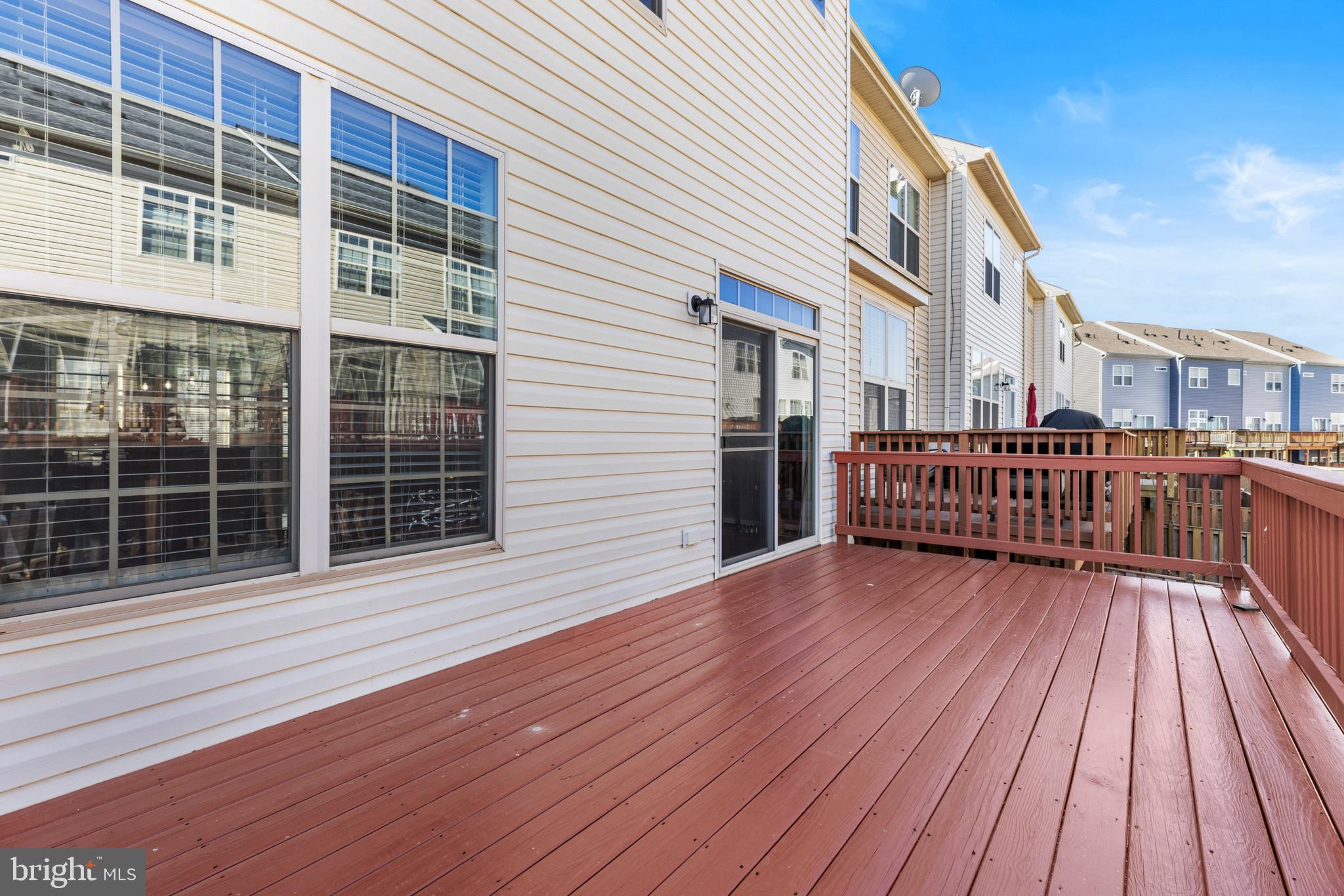 6552 Britannic Place Frederick, MD 21703 - Photo 15 of 34 a view of a house with balcony wooden floor