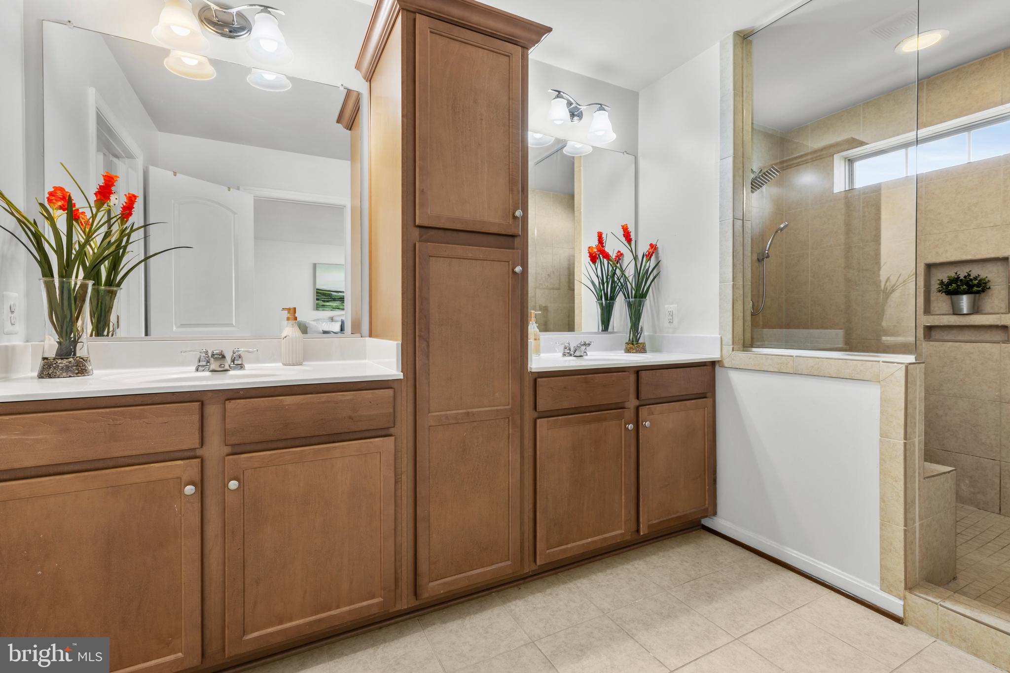 6552 Britannic Place Frederick, MD 21703 - Photo 19 of 34 a bathroom with a sink vanity and a mirror