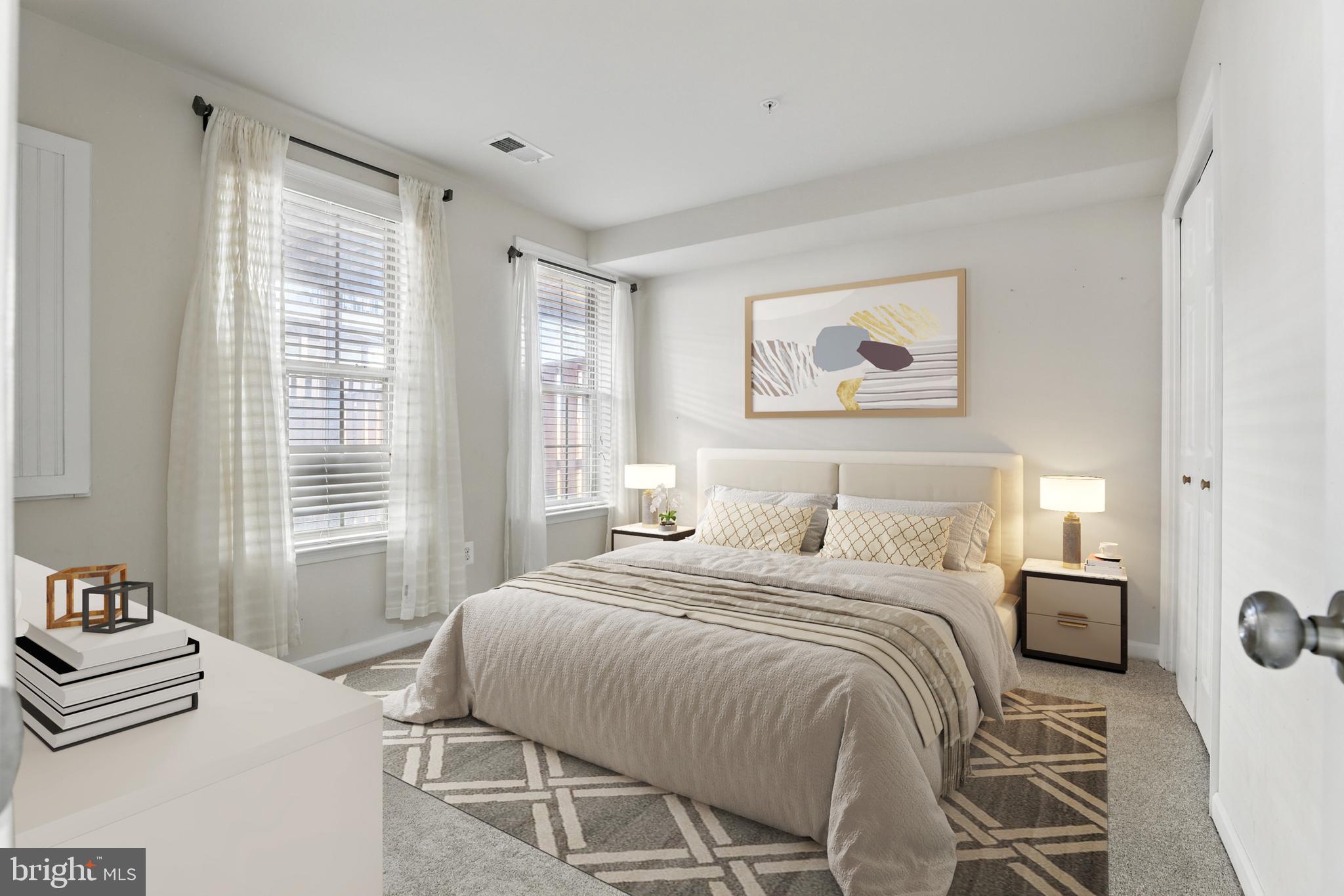 6552 Britannic Place Frederick, MD 21703 - Photo 29 of 34 a bedroom with a bed and a window