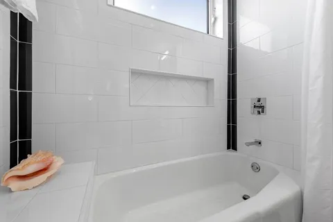 a bathroom with a tub