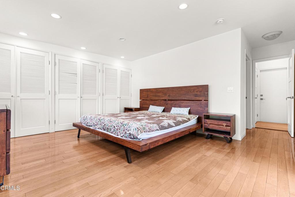 3323 Reta Street La Crescenta, CA 91214 - Photo 18 of 18 a bedroom with a bed and wooden floor