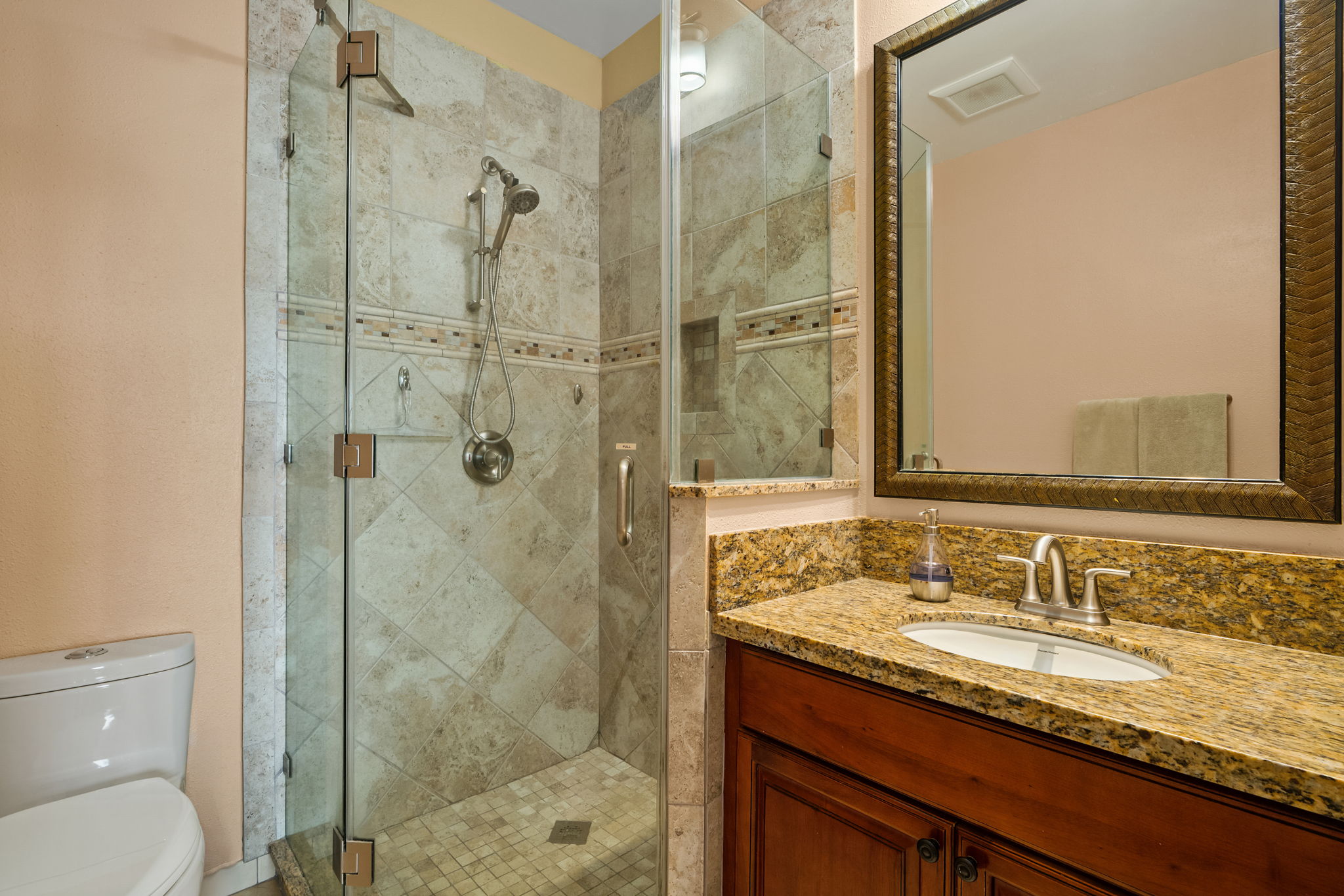 410 Papaloa Road, Unit 233 Kapaa, HI 96746 - Photo 16 of 27 a bathroom with a granite countertop sink toilet and shower