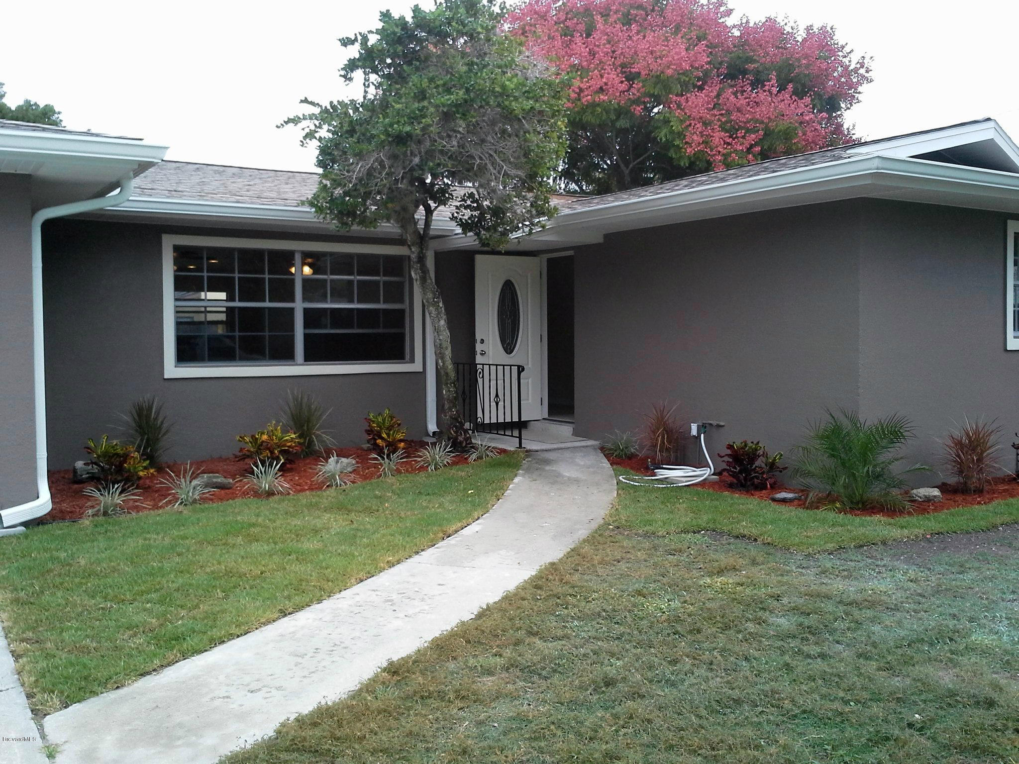 942 Kings Post Road Rockledge, FL 32955 - Photo 2 of 12 Front Entry