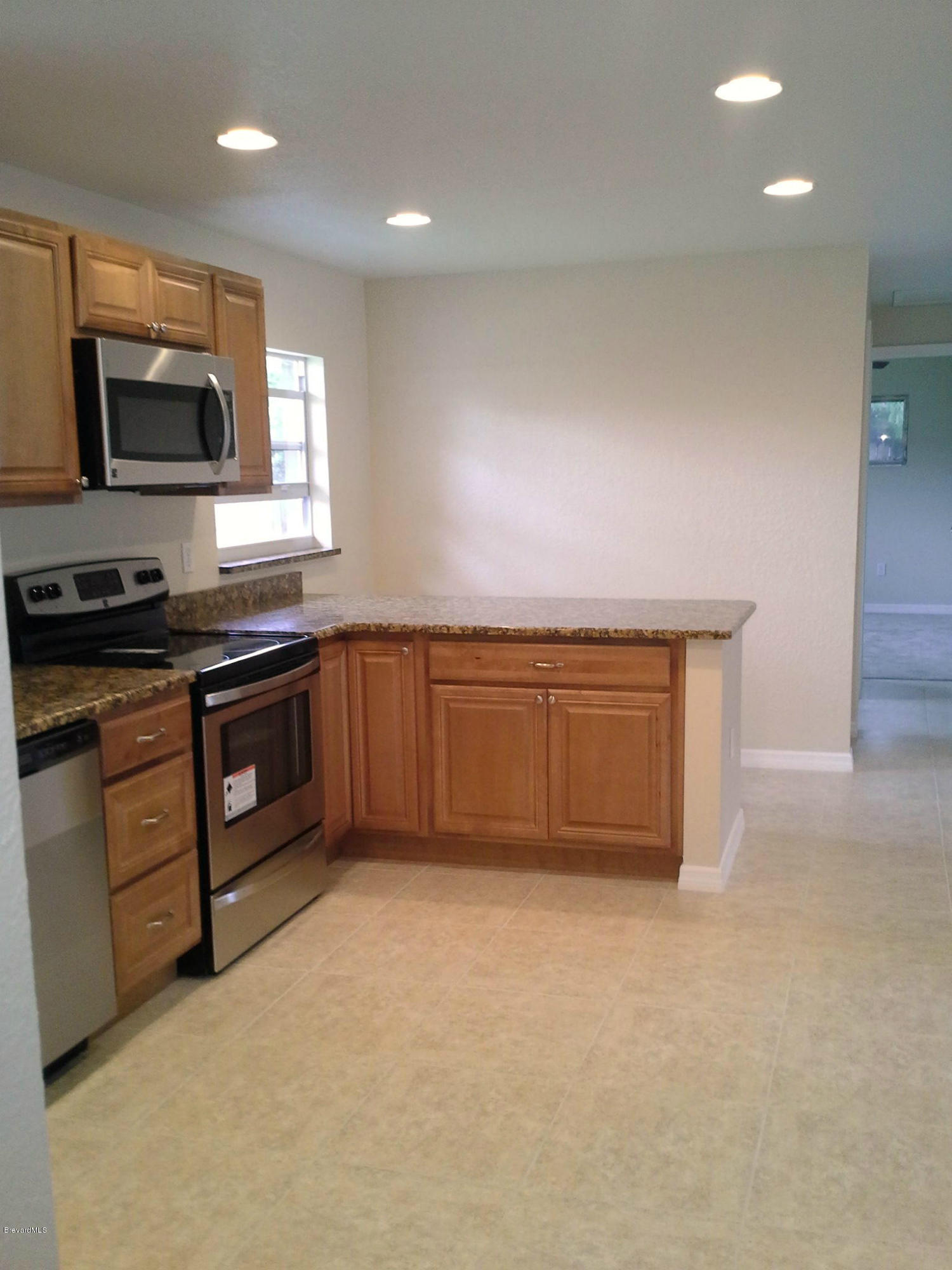 942 Kings Post Road Rockledge, FL 32955 - Photo 6 of 12 Kitchen