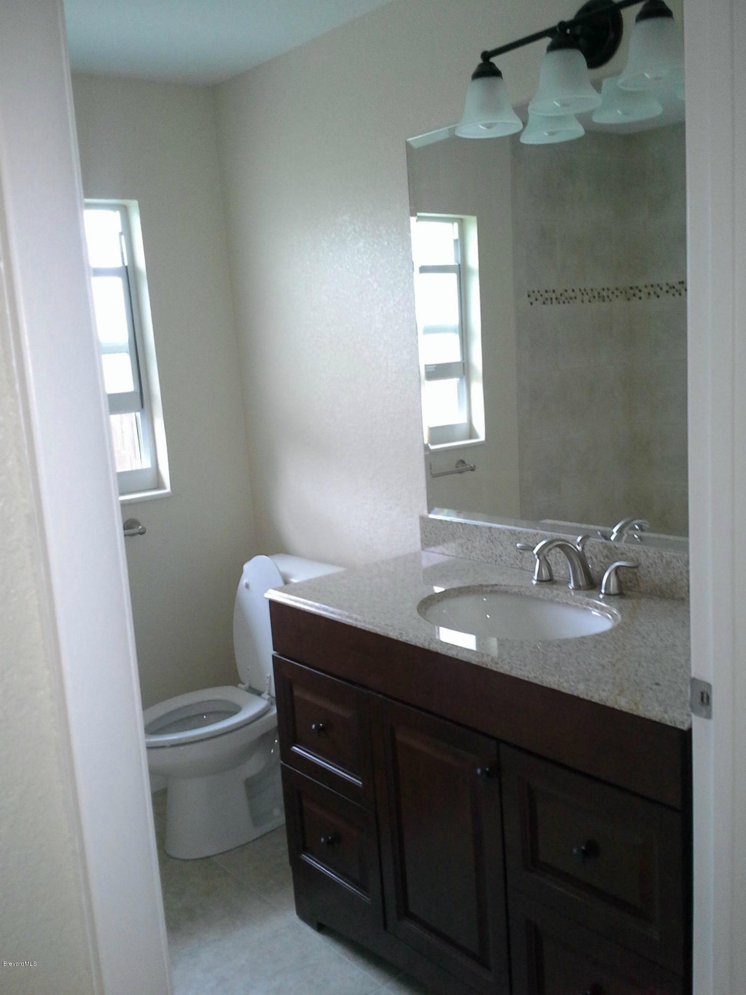 942 Kings Post Road Rockledge, FL 32955 - Photo 8 of 12 Bathroom