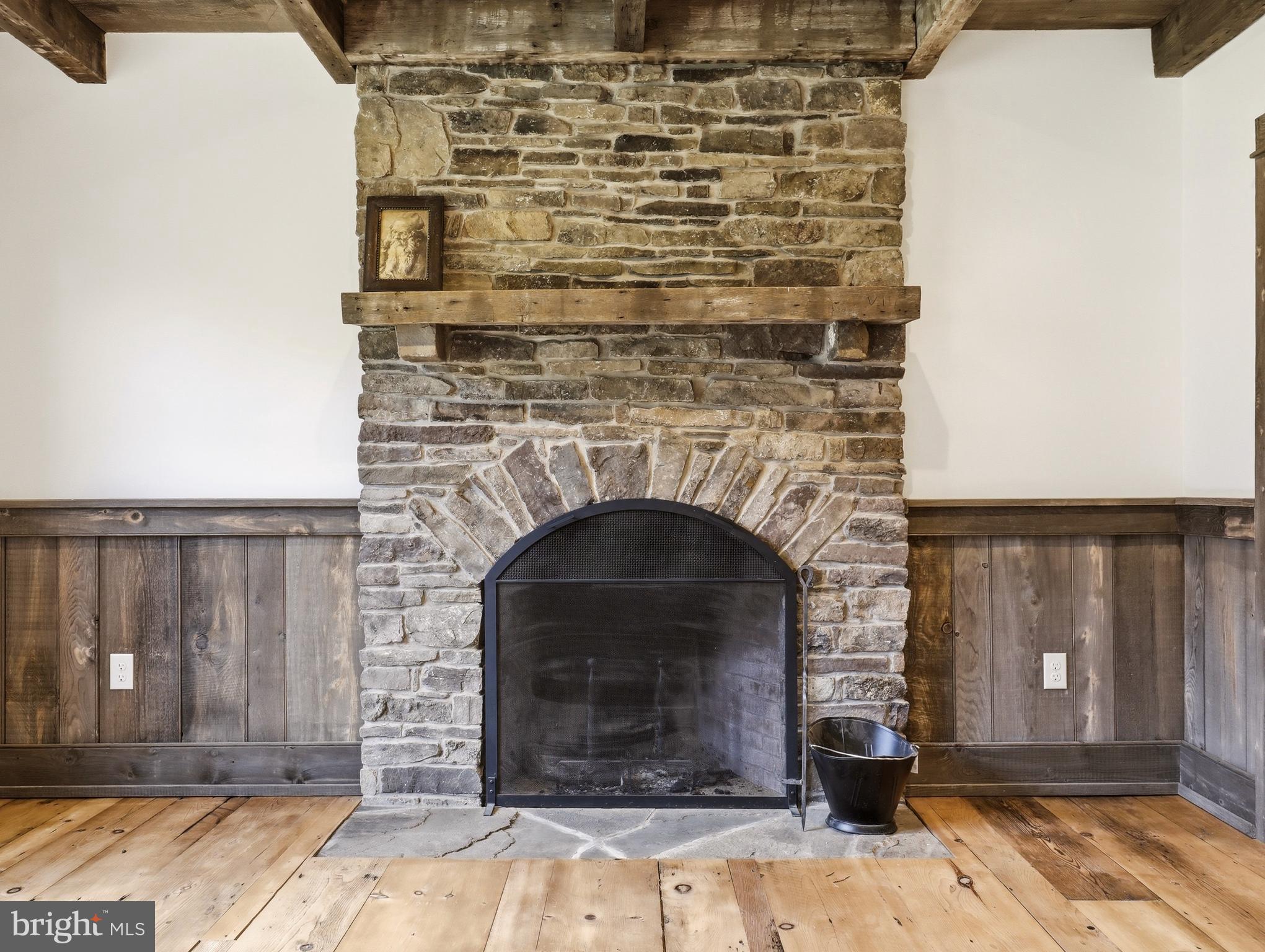 755 Grammer Road Williamsport, PA 17701 - Photo 18 of 81 a stone house with a fireplace in front of it