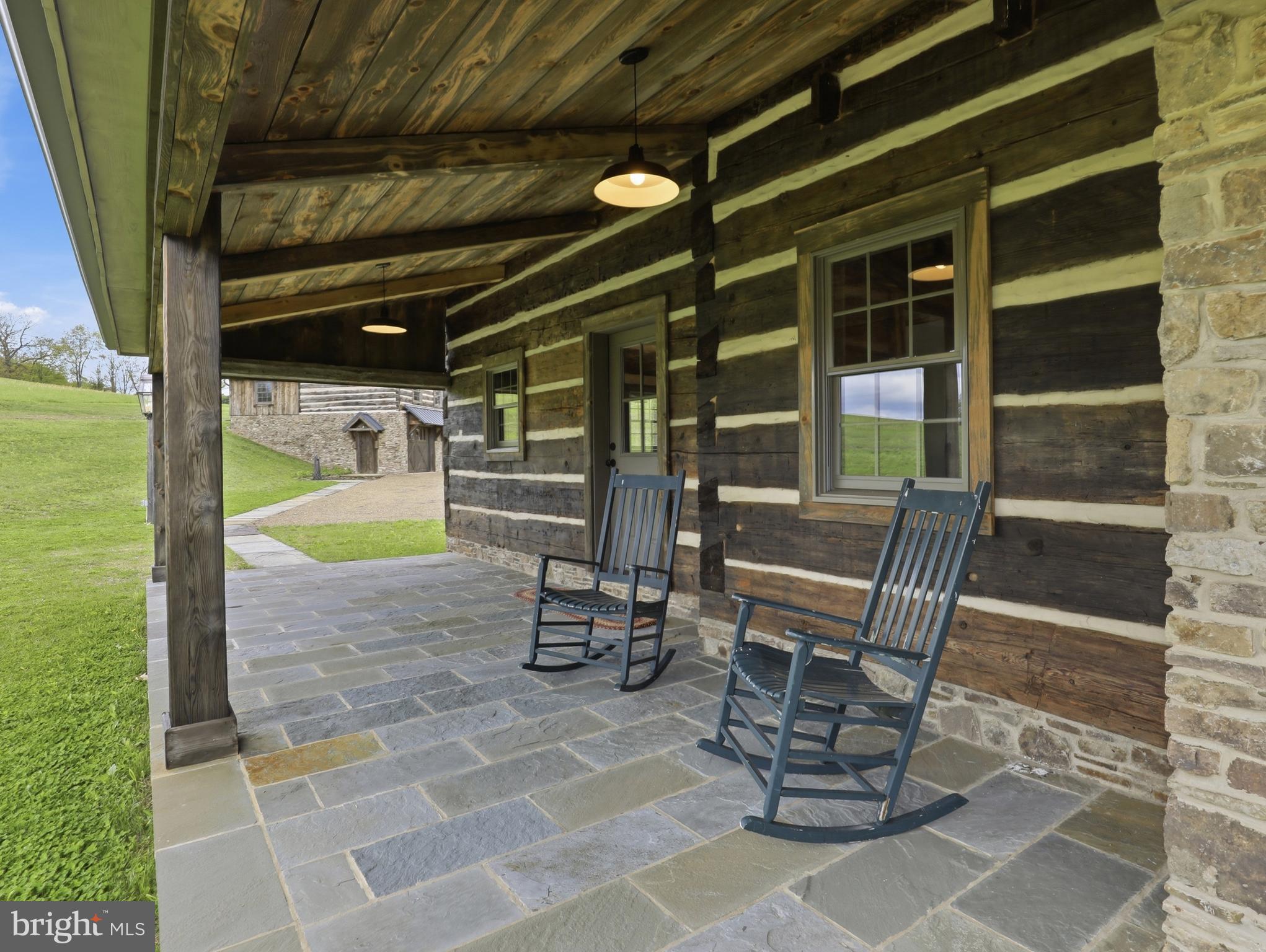 755 Grammer Road Williamsport, PA 17701 - Photo 23 of 81 a view of a patio with table and chairs and wooden floor