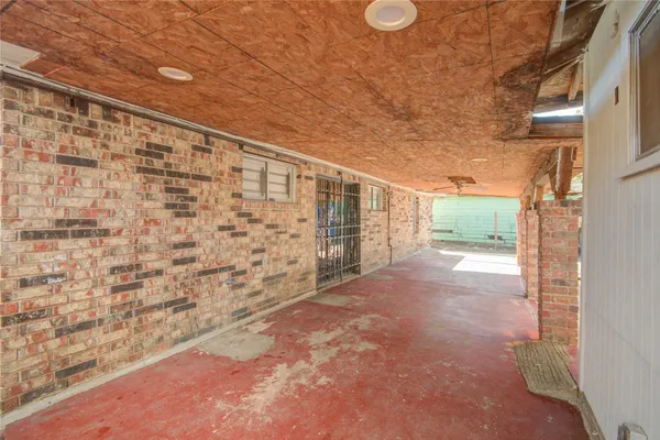 a view of a backyard of the house