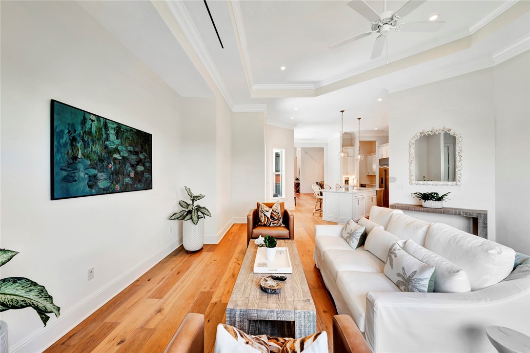11 Caribe Way Vero Beach, FL 32963 - Photo 11 of 31 a living room with furniture and a flat screen tv