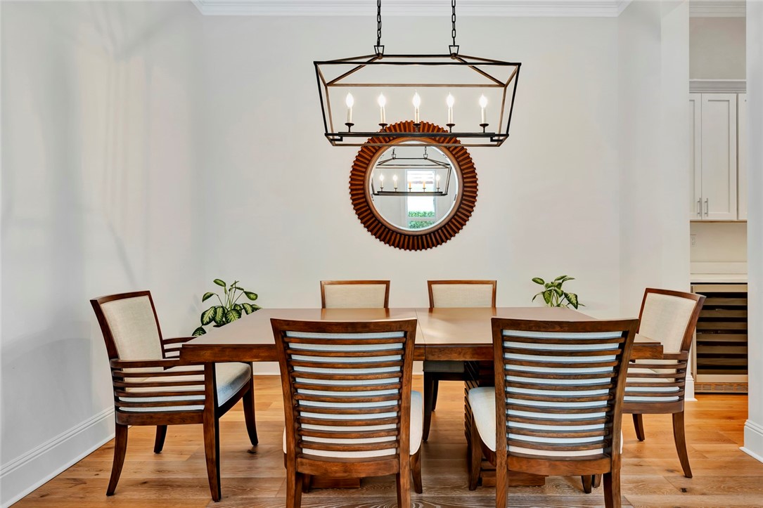 11 Caribe Way Vero Beach, FL 32963 - Photo 12 of 31 a view of a dining room with furniture and wooden floor