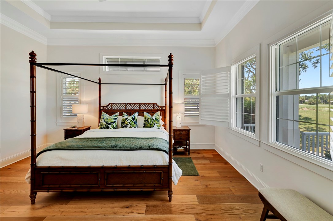 11 Caribe Way Vero Beach, FL 32963 - Photo 15 of 31 a bedroom with a bed and window