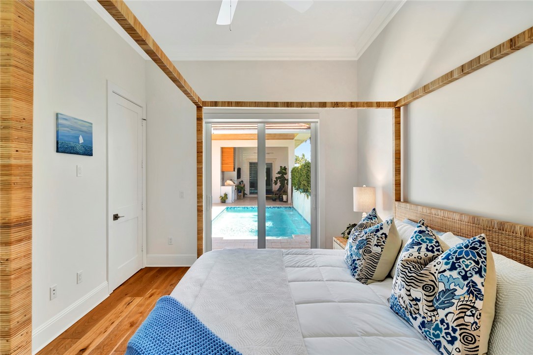 11 Caribe Way Vero Beach, FL 32963 - Photo 19 of 31 a bedroom with a bed and a window