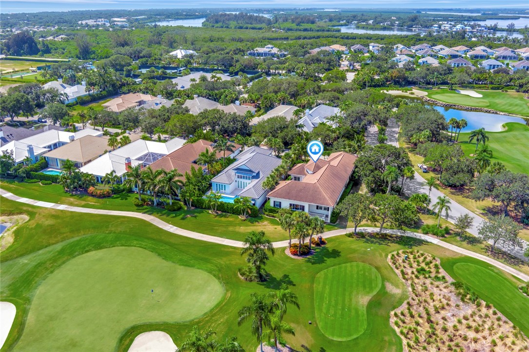 11 Caribe Way Vero Beach, FL 32963 - Photo 24 of 31 an aerial view of residential houses with outdoor space and city view